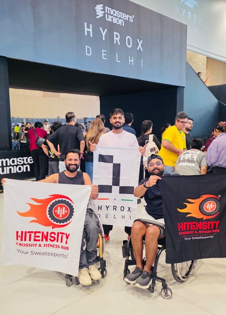 Mohammad Imran and team holding HYROX Delhi flag and Hitensity banner with pride